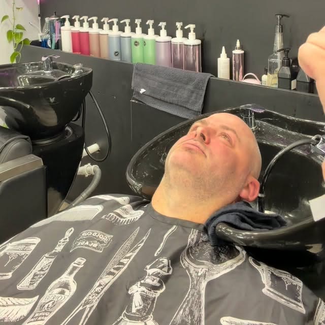 Client relaxing at the wash station